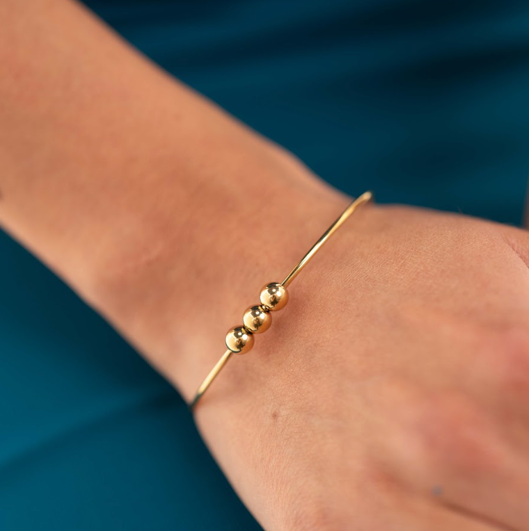 Golden Aura Adjustable Bead Bracelet